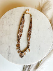 Scarf Necklace with Coin, Bow, & Pearl Charms - Brown
