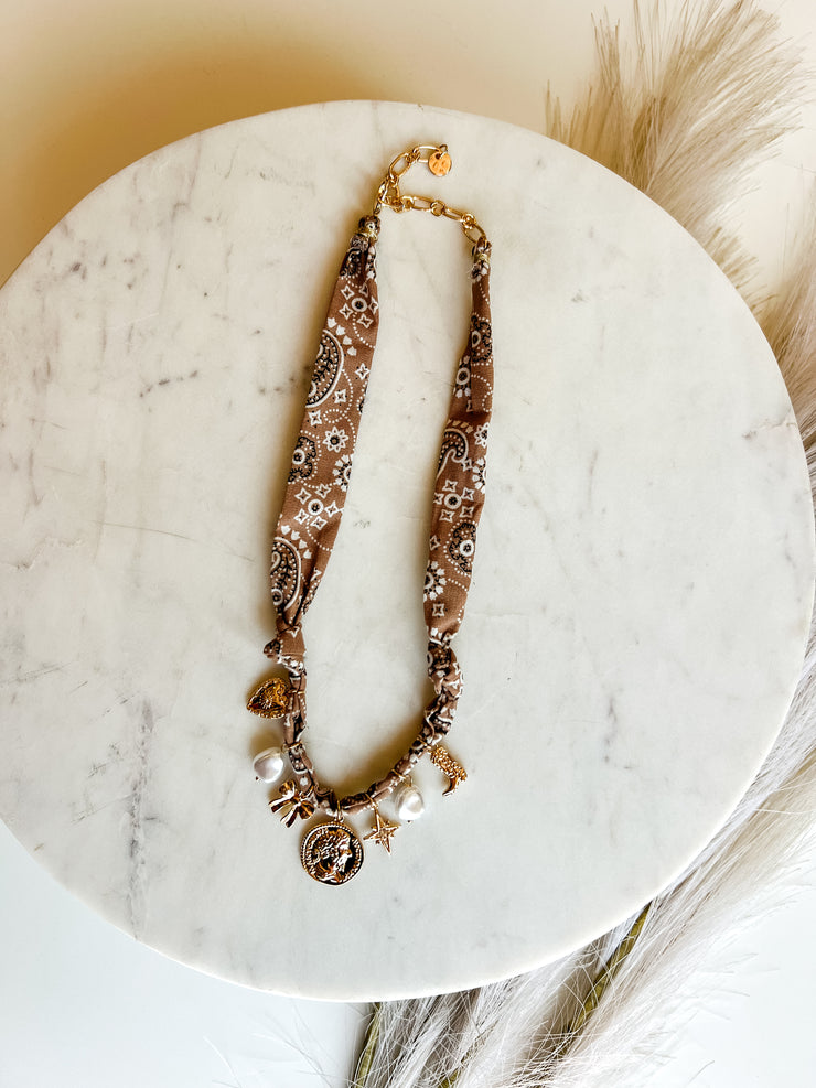 Scarf Necklace with Coin, Bow, & Pearl Charms - Brown